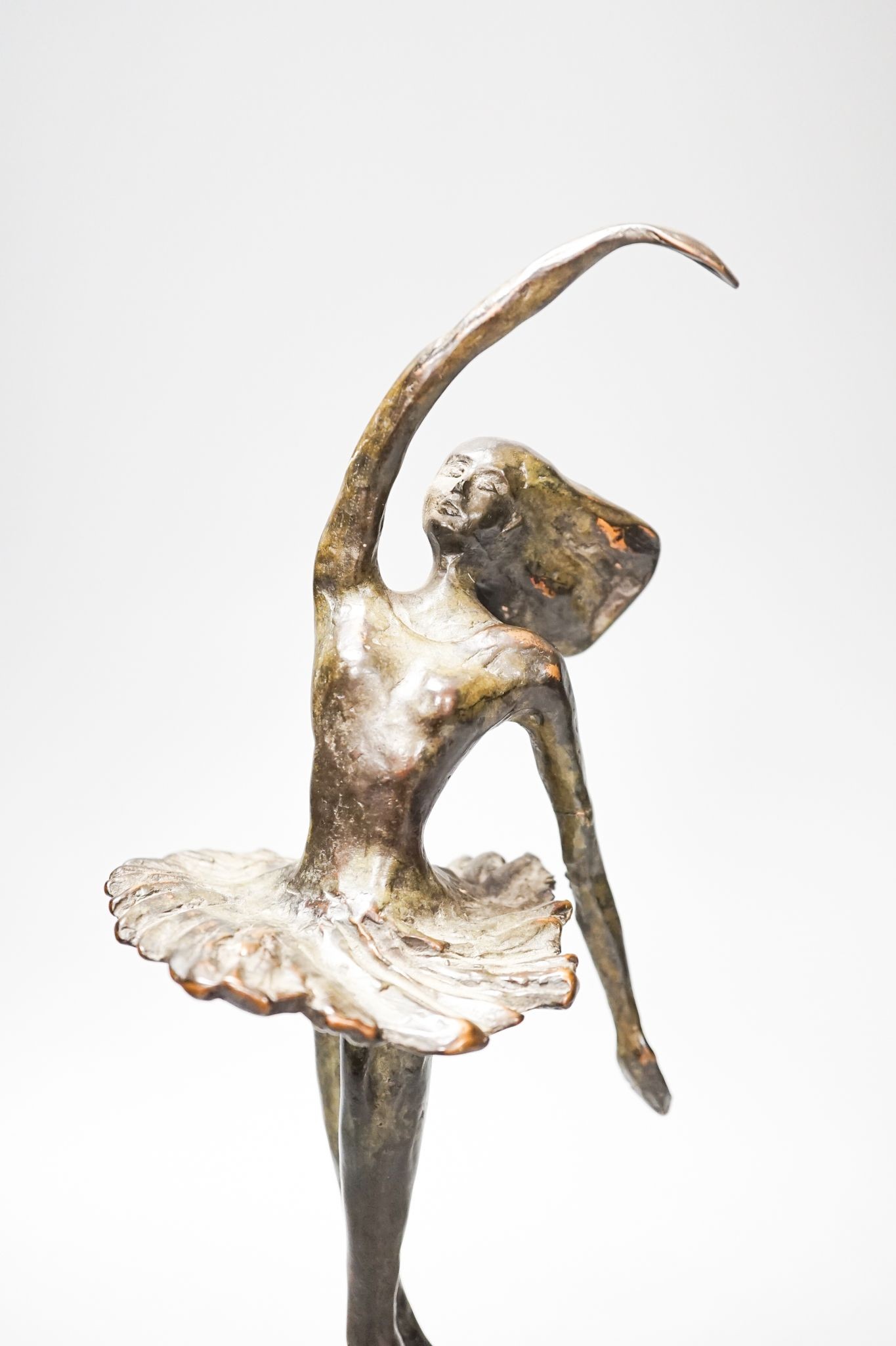 A 20th century bronze figure of a ballerina, indistinctly initialled CAN (?), 33cm